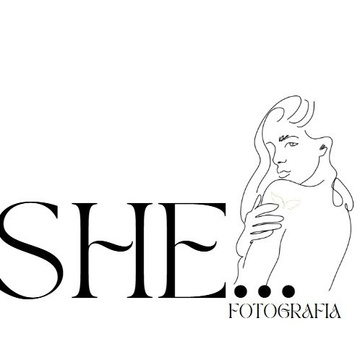 SHE...