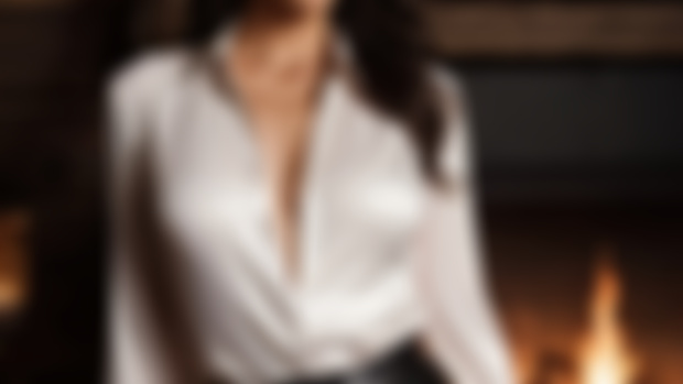 White satin blouse and black leather pants