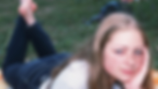 Chloe 18 y.o. in jeans shows her size 12 feet