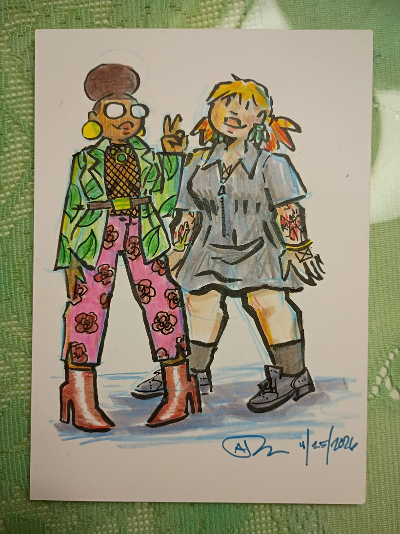 A drawing of Val and Tori in ink, marker, and colored pencil