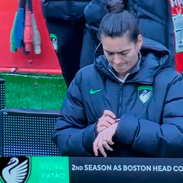 Boston Legacy coach Filipa Patão checks her watch during the game on May 3, 2026, that got the NWSL expansion team its first win. 