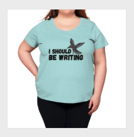 photo of plus sized model wearing blue shirt with the ISBW logo on it.
