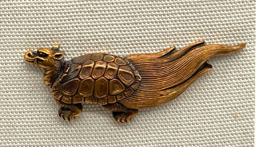 an antique broache