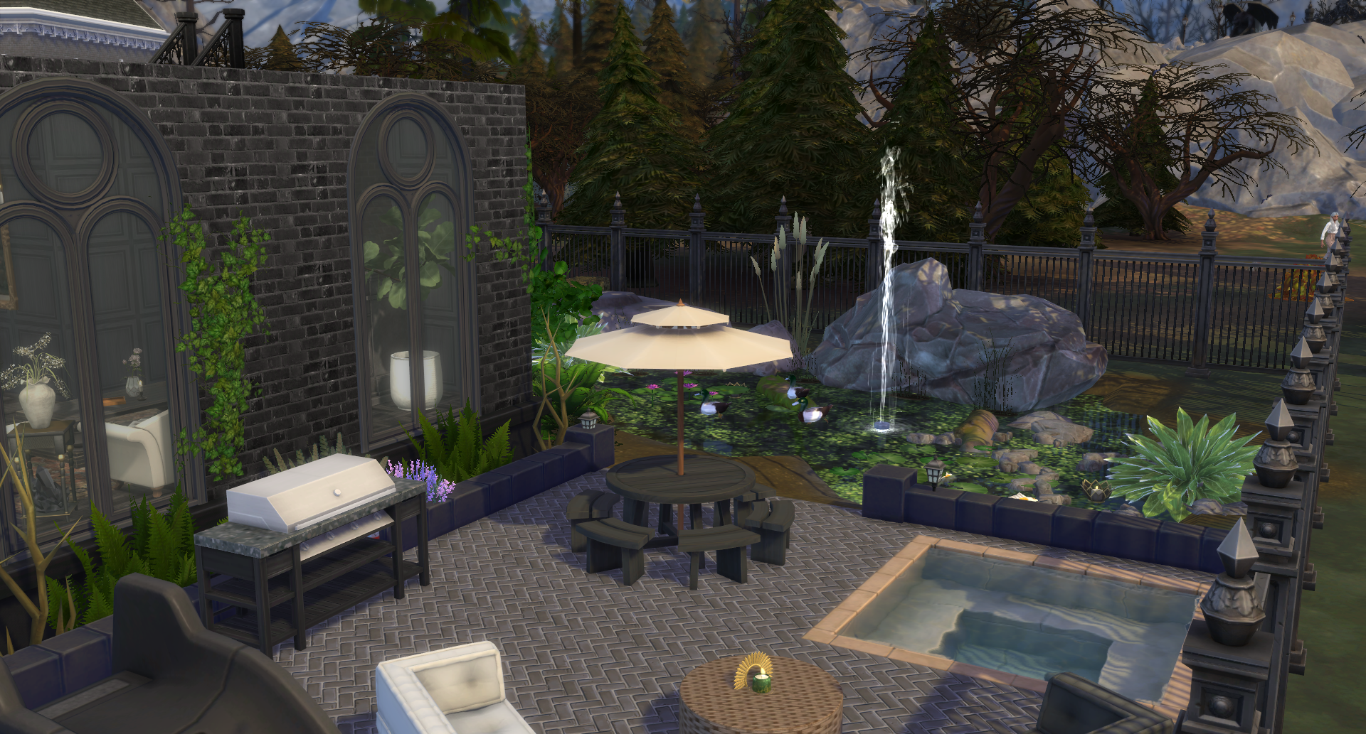 Outdoor patio and swimming pool at Fledermaus Bend