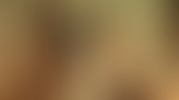 Naked woman in a cave on the shore