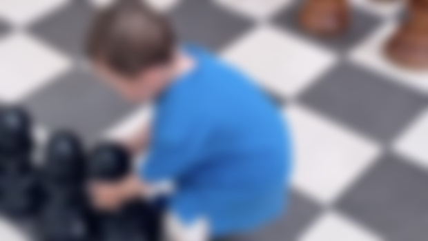 Playing gigantic chess 